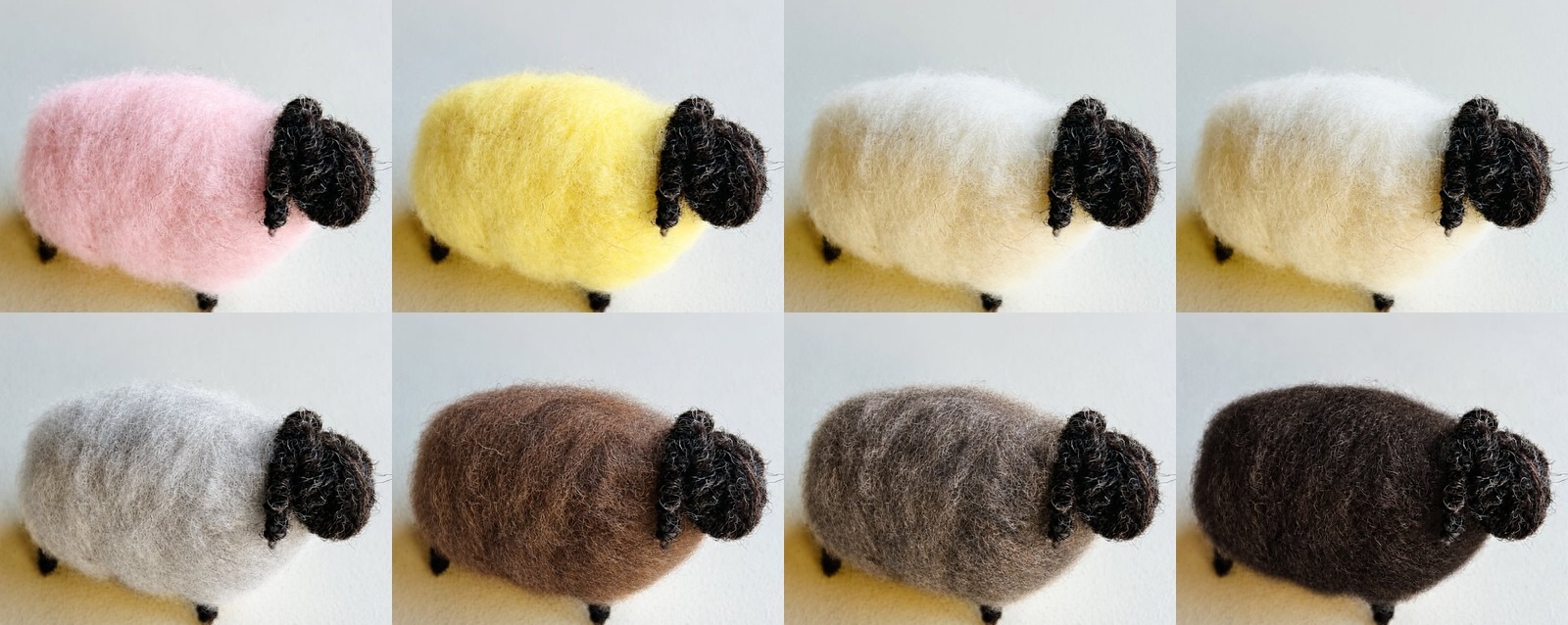 カラフル羊セットで作った8色の羊。ピンク・黄色・白・ベージュ・うすグレー・モカ茶・グレー・黒茶